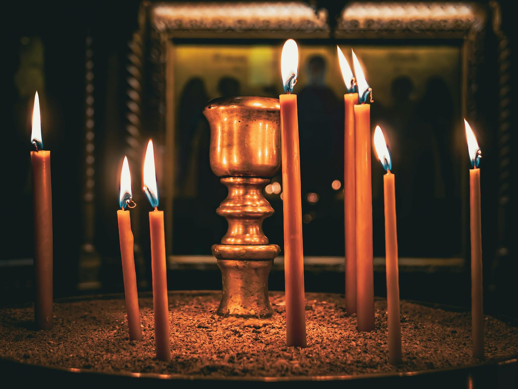 Peaceful candlelight setting in a Greek Orthodox church, capturing the spiritual atmosphere and religious tradition. on The Manifesting Light