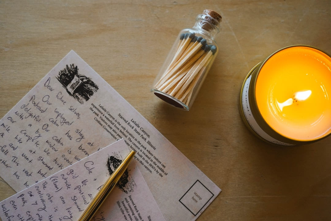 Writing letters by candlelight, with matches. on The Manifesting Light